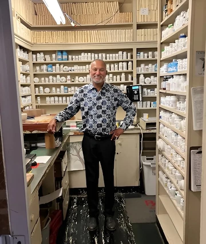 Local customers chatting with staff at Carmel Drug Store